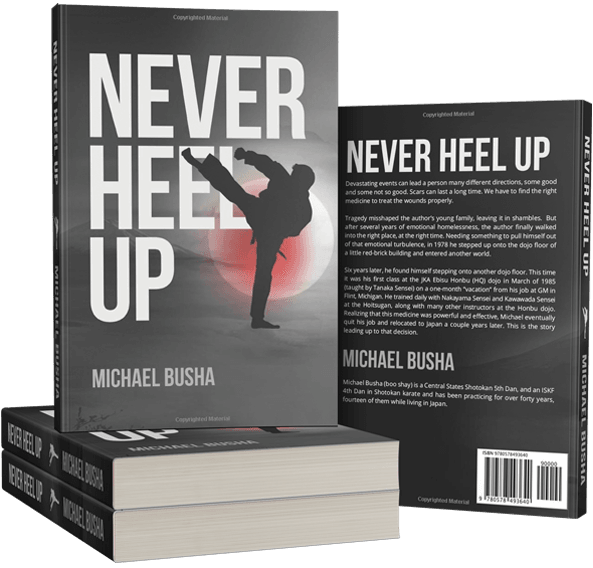 Never Heel Up by Michael Busha — front and back covers of the paperback